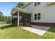 Spacious screened porch with ceiling fan overlooking backyard, perfect for outdoor relaxation at 550 Spring Flowers Dr, Cameron, NC 28326