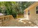 Wooden back deck with railing, stairs, and a view of the backyard at 5911 Westcreek Pl, Raleigh, NC 27606