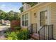 Attractive home exterior with well-kept lawn, charming front porch, and lots of natural light at 5911 Westcreek Pl, Raleigh, NC 27606