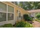 Inviting home exterior featuring a well-maintained front yard with vibrant yellow flowers at 5911 Westcreek Pl, Raleigh, NC 27606