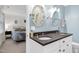 Stylish bathroom with double vanity and a view into the bedroom at 608 Misty Isle Pl, Raleigh, NC 27615