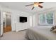 Comfortable bedroom with dresser, television, carpet, and closet at 608 Misty Isle Pl, Raleigh, NC 27615