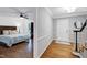 Hallway view of a bedroom with ceiling fan and built-in bookcase at 608 Misty Isle Pl, Raleigh, NC 27615