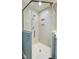 Modern walk-in shower with white subway tile and glass enclosure at 608 Misty Isle Pl, Raleigh, NC 27615