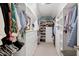 Well-organized walk-in closet with ample shelving and storage space at 608 Misty Isle Pl, Raleigh, NC 27615