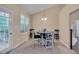 Bright eat-in kitchen with hardwood floors, breakfast table, and lots of natural light at 62 Mountain Laurel Ln, Four Oaks, NC 27524