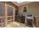 Screened patio with gas grill at 62 Mountain Laurel Ln, Four Oaks, NC 27524