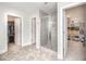 Bathroom features a glass shower, closet, and dressing room at 645 Longstanton Ave, Zebulon, NC 27597