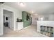 Upstairs hallway featuring modern carpet and a green accent wall at 645 Longstanton Ave, Zebulon, NC 27597