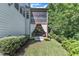 View of the back of the house, showing the screened porch and outdoor patio at 6509 Conaway Ct, Wake Forest, NC 27587