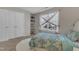 Comfortable bedroom with a window seat beneath the window and a closet providing ample storage space at 6509 Conaway Ct, Wake Forest, NC 27587