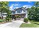Charming two-story house featuring stone and siding, with a spacious driveway and lawn at 6509 Conaway Ct, Wake Forest, NC 27587