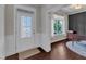 Entryway with decorative leaded glass door and hardwood flooring, leading to the office at 6509 Conaway Ct, Wake Forest, NC 27587