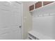 Mudroom with built-in storage, coat hooks, and a bench for added convenience at 6509 Conaway Ct, Wake Forest, NC 27587