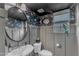 Charming powder room with floral wallpaper, modern fixtures, and natural light at 6509 Conaway Ct, Wake Forest, NC 27587