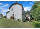 This two-story home boasts a screened-in porch, patio, and stairs to the backyard at 6509 Conaway Ct, Wake Forest, NC 27587