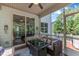 This relaxing screened porch with sliding doors offers a cozy spot with wicker furniture at 6509 Conaway Ct, Wake Forest, NC 27587