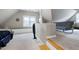 Bedroom featuring built-in seating, large windows, and a gray sofa at 709 Bonhurst Dr, Holly Springs, NC 27540