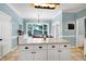 Inviting breakfast area with backyard views and convenient island storage at 709 Bonhurst Dr, Holly Springs, NC 27540
