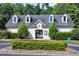 Charming community clubhouse featuring well-maintained landscaping and a welcoming entrance at 709 Bonhurst Dr, Holly Springs, NC 27540