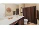 Bathroom featuring a vanity, toilet, shower with curtain, and neutral walls at 744 Birch Arbor Cir, Raleigh, NC 27604