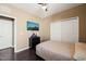 Comfortable bedroom with a ceiling fan, neutral walls, hardwood floors, and natural light at 744 Birch Arbor Cir, Raleigh, NC 27604