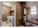 Clean laundry room with washer and dryer and lots of natural light at 744 Birch Arbor Cir, Raleigh, NC 27604