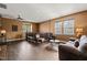 Open loft features hardwood floors, recessed lighting, neutral paint, and a comfortable sitting area at 744 Birch Arbor Cir, Raleigh, NC 27604