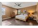 Main bedroom with hardwood floors, a ceiling fan, neutral paint, and natural light from the window at 744 Birch Arbor Cir, Raleigh, NC 27604