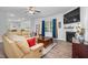 Bright living room featuring a fireplace, window views, and neutral decor at 98 Panmure, Rocky Mount, NC 27804