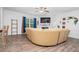 Spacious living room with wood floors and a comfortable curved sofa at 98 Panmure, Rocky Mount, NC 27804
