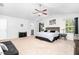 Well-lit main bedroom with ceiling fan and a seating area at 98 Panmure, Rocky Mount, NC 27804