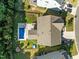 Aerial view of home featuring backyard pool, patio, screened porch, and fenced-in yard at 98 Stone Bridge Xing # 98, Chapel Hill, NC 27517