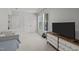 Inviting bedroom with a large window, cozy carpeting, and ample space for relaxation at 98 Stone Bridge Xing # 98, Chapel Hill, NC 27517