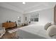 Spacious bedroom showcasing tray ceiling, wood floors and great natural light at 98 Stone Bridge Xing # 98, Chapel Hill, NC 27517