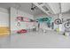 Spacious garage featuring ample storage solutions for bikes, boards, and tools at 98 Stone Bridge Xing # 98, Chapel Hill, NC 27517