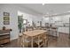 Bright, eat-in kitchen with a center island, bar seating, and stainless appliances at 98 Stone Bridge Xing # 98, Chapel Hill, NC 27517