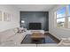 Cozy living room with modern decor and a large window view at 98 Stone Bridge Xing # 98, Chapel Hill, NC 27517
