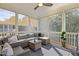 Cozy screened porch with comfortable seating, offering a relaxing outdoor space at 98 Stone Bridge Xing # 98, Chapel Hill, NC 27517