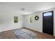 Inviting living room with hardwood floors and natural light, features fresh paint and modern accents at 1006 E Harnett St, Dunn, NC 28334