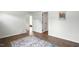 Bright living room with hardwood floors and fresh paint showcases the home's modern design at 1006 E Harnett St, Dunn, NC 28334