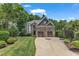 Charming two-story home featuring a two-car garage and lush landscaping in a desirable neighborhood at 104 Bellagio Dr, Apex, NC 27539