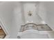 Elegant foyer featuring a high ceiling and decorative chandelier at 104 Bellagio Dr, Apex, NC 27539
