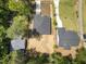 Aerial view of a home showing its layout and surrounding greenery in a well-established neighborhood at 107 Mohave Dr, Louisburg, NC 27549