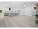 Spacious kitchen with a central island, modern appliances, and an open floor plan at 107 Mohave Dr, Louisburg, NC 27549