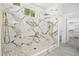 Large tiled walk-in shower features gold fixtures, seating, and natural light at 107 Mohave Dr, Louisburg, NC 27549