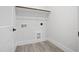 This utility room has plumbing and electrical hookups, as well as space for storage and folding at 107 Mohave Dr, Louisburg, NC 27549