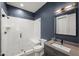 Modern bathroom with large walk-in shower, glass door, and sleek vanity at 109 Greenock Ct, Cary, NC 27511