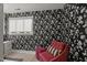This bedroom has wallpaper and a window at 109 Greenock Ct, Cary, NC 27511