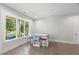 Sun-filled room with natural light, a table and chairs, and a large window at 109 Greenock Ct, Cary, NC 27511